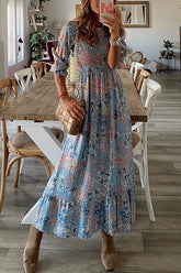 Vestido largo con cuello redondo y estampado floral